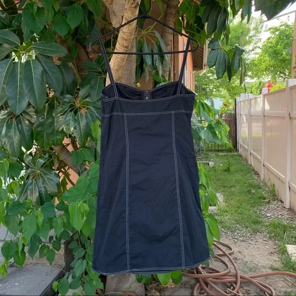 Black dress with white stitching. - Picture 5 of 5